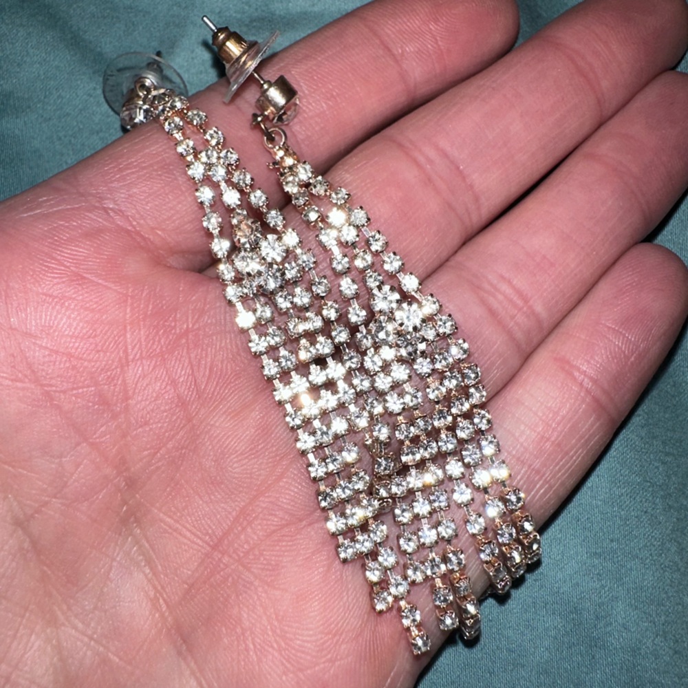 Long dangling diamond style earrings